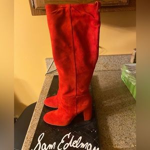Tall red suede boots, The boots are brand new and never been worn , size 9 !